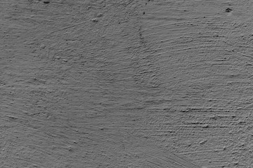 Texture of a concrete wall with cracks and scratches which can be used as a background