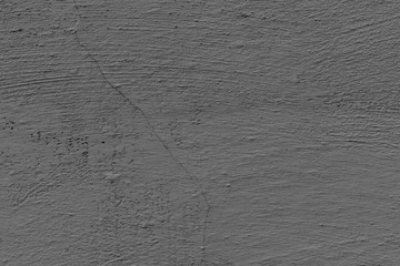 Texture of a concrete wall with cracks and scratches which can be used as a background