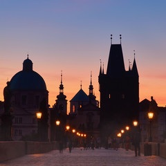 Prague at night, panoramic image. Charles Bridge early in the mo