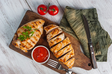 Fried chicken fillet and boiled vegetables