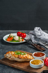 Fried chicken fillet and boiled vegetables