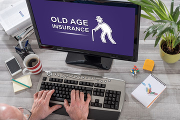 Old age insurance concept on a computer