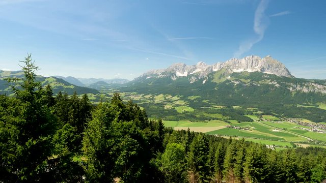 Beautiful alpine landscape with green meadows, alpine mountain peaks, St johan, Tyrol Alps, Austria