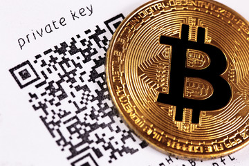 closeup bitcoin with private key