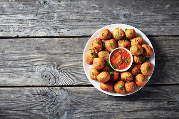 banana fritters Klako on a white plate