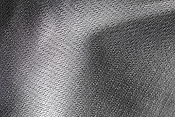 macro closeup grey nylon fabric textured background for design