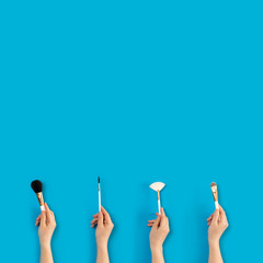 Woman using make-up brush