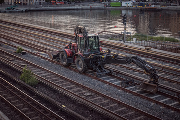 Naklejka premium Excavators machine excavate on railway