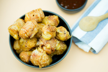 Fried meatballs is delicious in black bowl