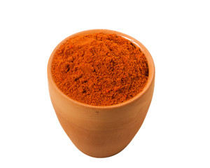 Paprika in a bowl isolated on a white background. View from above.