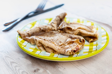 Homemade french buckwheat galette on the table
