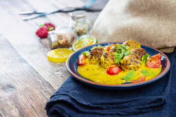 6 vegetable balls and quinoa , curry coconut cream