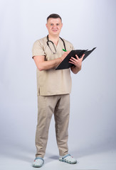 Private clinic. Experienced doctor beige clothes on white background. Check health. Doctor career. Man doctor with stethoscope physician uniform. Medicine and health care. Professional doctor