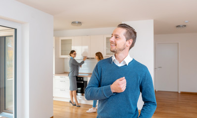 Man being satisfied with the new apartment he wants to buy