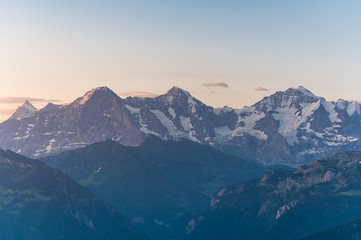 Fototapeta na wymiar Eiger Mönch und Jungfrau am frühen Morgen