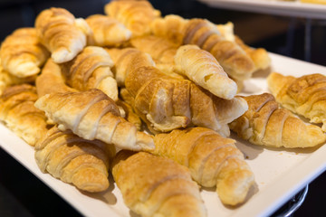 Fresh baked croissants ready to serve. soft focus