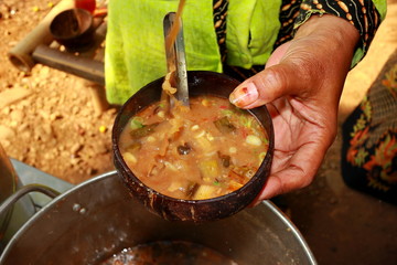 Soto Tauto, is a traditional dish from Pekalongan, served in a coconut shell bowl