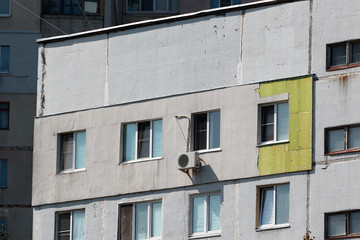 Obraz premium Outer thermal insulation of apartment in a highrise residential building