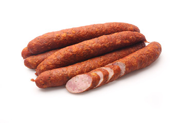 Smoked thin sausage on a white background. Food product.