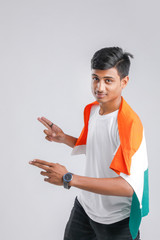 Young indian man with indian flag