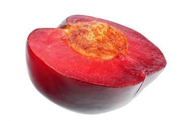half plum fruit isolated on white background. cut plum slices