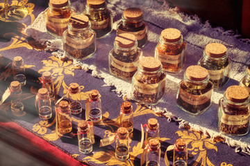 Transparent bottles with herbs and name, retro. Glass jars of spices with tags, vintage. Pepper, cumin, turmeric and other seasonings for food, lifestyle.