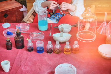 Flasks and bubbles with pigments, binders and paint thinner. Manufacture of paint for painting by...