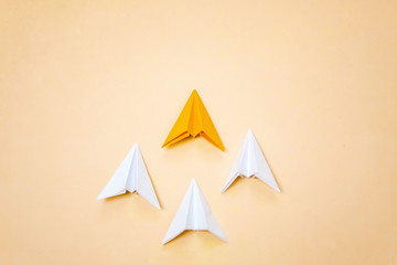 Leadership concept banner with origami paper planes with orange one leading other. Creative concept...