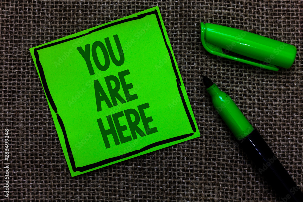 Poster writing note showing you are here. business photo showcasing this is your location reference point g