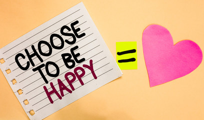 Text sign showing Choose To Be Happy. Conceptual photo Decide being in a good mood smiley cheerful glad enjoy Transverse white paper with words equal love heart on Peach color base