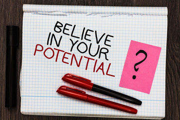 Word writing text Believe In Your Potential. Business concept for Have self-confidence motiavate inspire yourself Color pen on written notepad with question mark black marker on woody deck