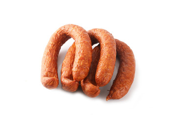  Thin sausage on a white background. Food product.