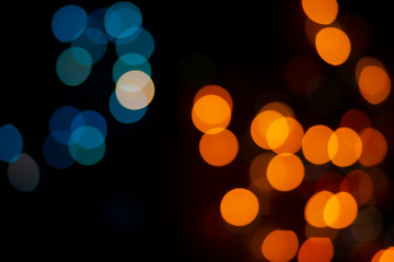 Fototapeta premium Bokeh abstract texture. Colorful. Defocused background.Bright lights on dark background.