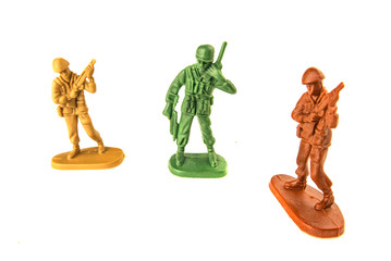miniature toy soldiers isolated on white background.