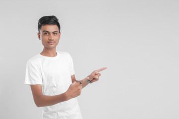 young Indian man giving multiple expression.