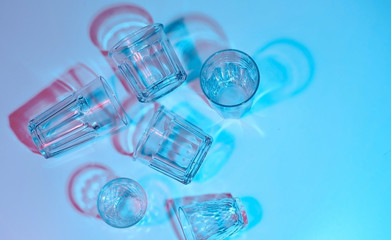 Glass faceted glasses. Color lighting. Art photography.