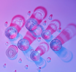 Glass faceted glasses. Color lighting. Art photography.