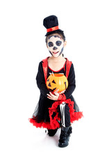 little girl holding jack o lantern pumpkin basket