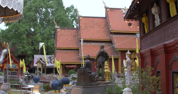 Buddha statues and pavilion at Wat Sri Suphan, Chiang Mai, panning shot