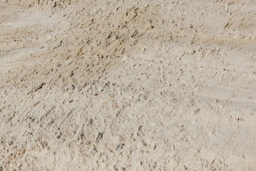 Wet sand texture in the sea shore beach - retro, vintage style look