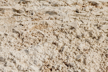 Wet sand texture in the sea shore beach - retro, vintage style look