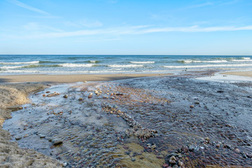 Tranquil summer scene of Baltic sea. Beautiful blue sky with cloud.