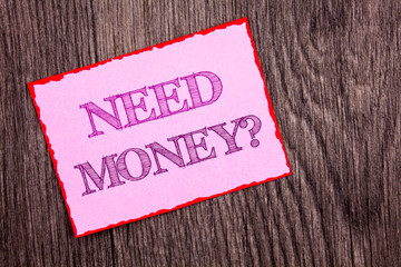 Handwriting Announcement text showing Need Money Question. Conceptual photo Economic Finance Crisis, Cash Loan Needed written Pink Sticky Note Paper the wooden background.