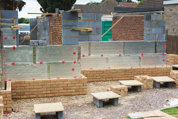 Renovation projects. Building of extension of the existing house, insulated brick walls, selective focus