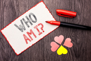 Conceptual hand writing showing Who Am I Question. Business photo text Question Asked Identity Thinking Doubt Psycology Mystery written Cardboard Piece With Marker wooden background Hearts.