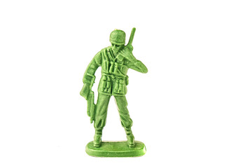 miniature toy soldier on white background, close-up