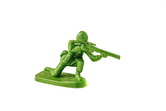 miniature toy soldier on white background, close-up
