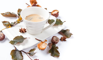 Naklejka na ściany i meble Autumn composition. Cup of coffee and leaves on white background. Flat lay, top view, copy space Autumn