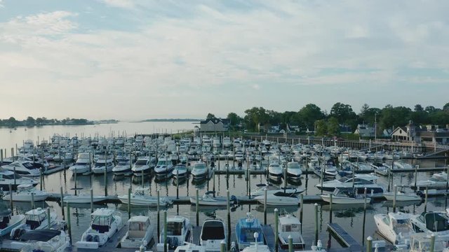 Sunrise Aerial Drone Flyover of Quiet Marina (Norwalk, Connecticut)