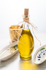 bottle of olive oil and olives